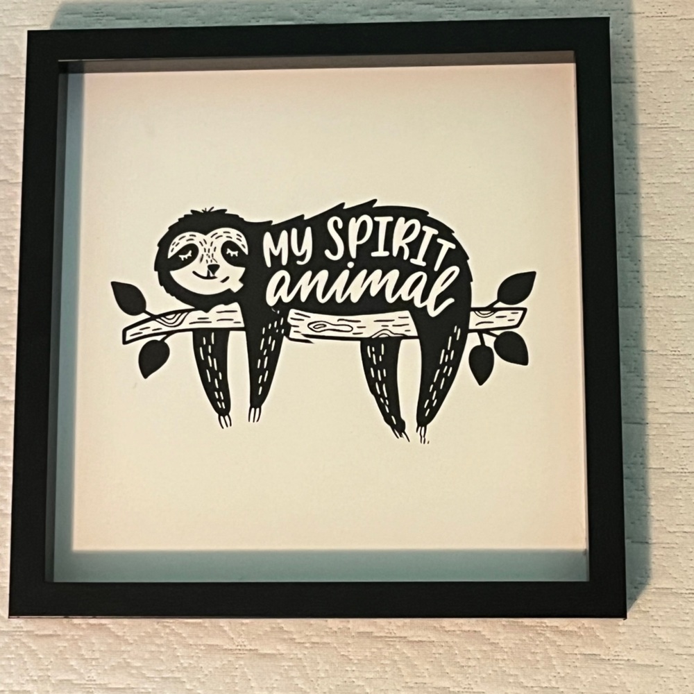 Spirit Animal sloth wall hanging.